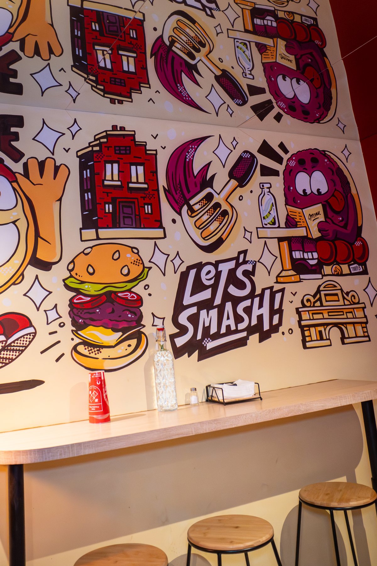 Fresque illustrée sur mesure dans le restaurant Burgouzz